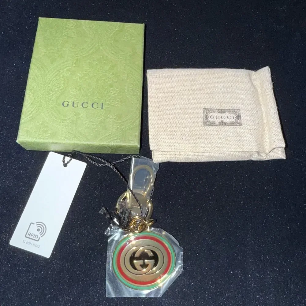 Brand new with box and dustbag Gucci Gold and Green Keychain
